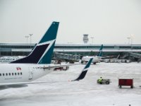 We started our journey early being upgraded to First Class by a friendly WestJet attendant in Winnipeg! In Toronto we get our last look at snow and ice for a few weeks!